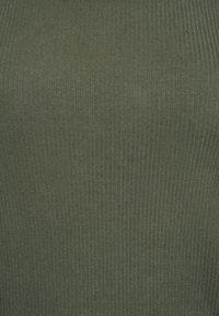 Close-up of dark green ribbed fabric with vertical texture and evenly spaced fine lines.