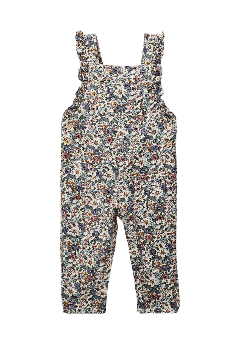 Salopette à motif floral en tissu doux, dotée de bretelles à volants, d'une poche avant et d'accents en boutons en bois sur les côtés.