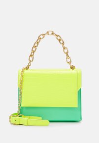 Neon green and yellow handbag made of textured synthetic material, featuring a gold chain handle and optional shoulder strap.