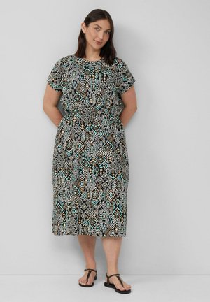Geprinte midi-jurk met korte mouwen en een elastische taille. Heeft geometrische patronen in zwart, wit, turquoise en goud.