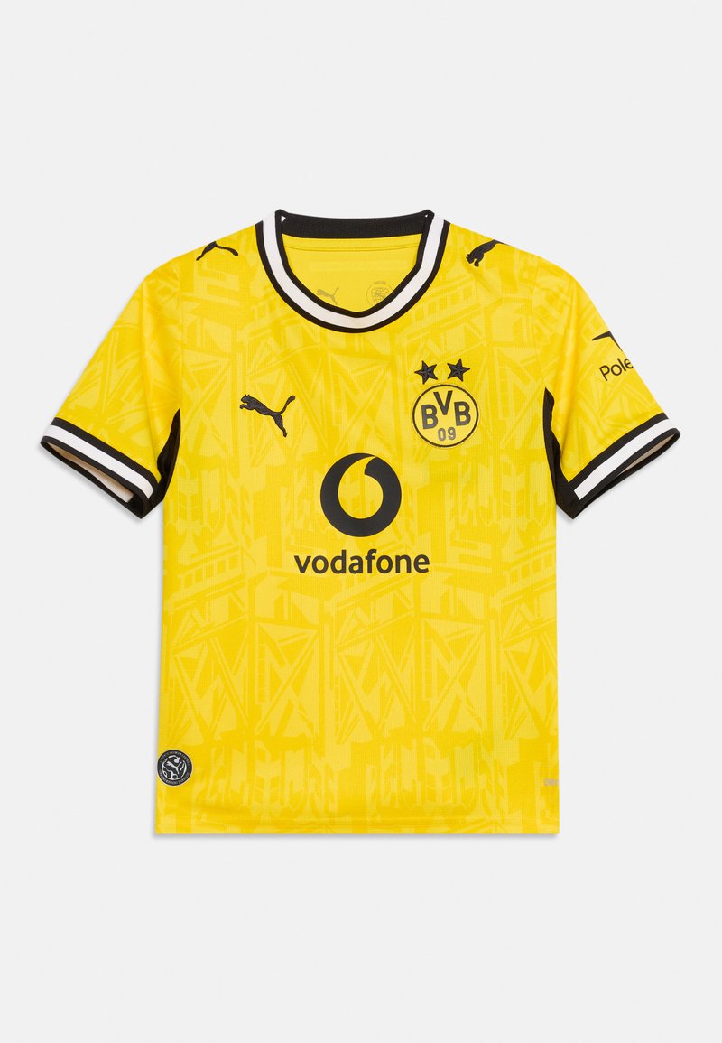 Κίτρινη φανέλα ποδοσφαίρου της Borussia Dortmund με μαύρα λογότυπα Puma, χορηγό Vodafone και μαύρη και λευκή λεπτομέρεια στο γιακά και τα μανίκια.