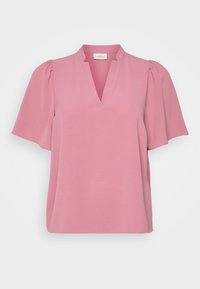 Pink short-sleeve top with a V-neck, made from lightweight fabric. Features subtle textured pattern and puffed sleeves for added volume.
