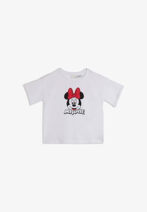Camiseta blanca de manga corta hecha de algodón, con una gráfica de la cara de un personaje con un lazo rojo y la palabra "MINNIE" debajo.