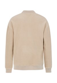Felpa in pile beige con scollatura rotonda, polsini e orlo a costine, caratterizzata da una texture morbida e una vestibilità comoda. Vista posteriore mostrata.