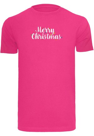T-shirt à manches courtes rose avec "Joyeux Noël" en écriture blanche et des accents de lumières colorées. En coton, coupe classique.