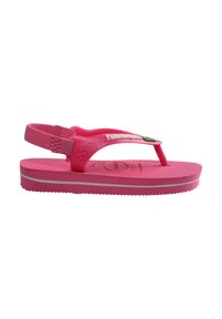 Infradito rosa per bambini con cinturino posteriore, soletta testurizzata, logo bianco del marchio e un piccolo emblema decorativo sul cinturino.