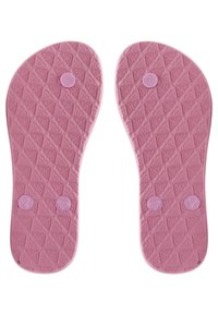 Rosa gummisandalsåler med et tekstureret diamantmønster, der har to runde rosa knapper mærket "1-2 R" og skridsikker design.
