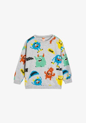 Grå sweatshirt med farverige monstergrafikker og tekst. Rund hals, lange ærmer, blødt stof. Mønstrene inkluderer blå, grønne, røde og gule monstre.