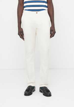 Tommy Hilfiger BLEECKER TEXTURED PRINT SLIM TROUSERS - Chinos - ivory petal