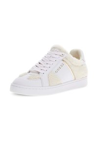 White sneakers with a textured fluffy accent, featuring a gold logo detail, lace-up design, and a smooth rubber sole. Casual style.