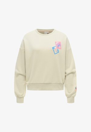 Beige sweatshirt med rund hals og lange ærmer, ribstrikkede manchetter og kant, med små blå og rosa frimærkedesign på brystet og ærmet.