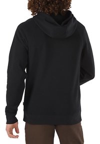 Felpa nera con cappuccio in morbido tessuto, dotata di cappuccio con cordino e polsini a costine, vista da dietro.