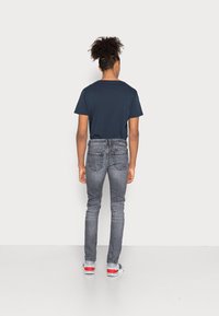 Diesel SLEENKER - Calças de ganga de corte skinny - 09c68 02