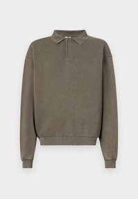 Olive green polo sweatshirt with a quarter zipper, long sleeves, ribbed cuffs, and a relaxed fit. Made from soft, textured fabric.