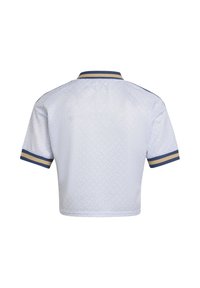 Chemise blanche à manches courtes avec un motif texturé subtil, rayures doubles bleu marine et or sur le col et les poignets des manches, vue de dos.