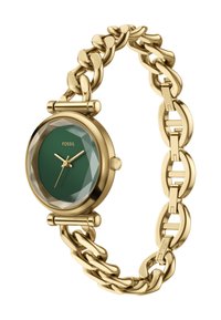 Gouden metalen horloge met een robuste kettingband, voorzien van een groene gefacetteerde wijzerplaat en gouden wijzers. Uniek gedurfde ontwerpe met opvallende accenten.