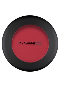 Poudre blush rouge dans un compact noir avec finition mate. Présente une surface texturée et un logo au centre.