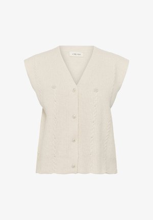 Cremfarbener ärmelloser Strickpullover mit V-Ausschnitt, ausgestattet mit einem Zopfmuster, perlenartigen Knöpfen und kleinen dekorativen Perlen auf der Vorderseite.
