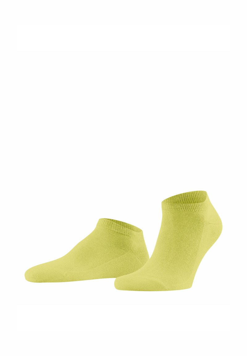 Jaskrawozielone skarpetki o niskim kroju, wykonane z miękkiego, elastycznego materiału, z żeberkowym wykończeniem i gładką fakturą. Idealne do codziennych lub sportowych stylizacji.