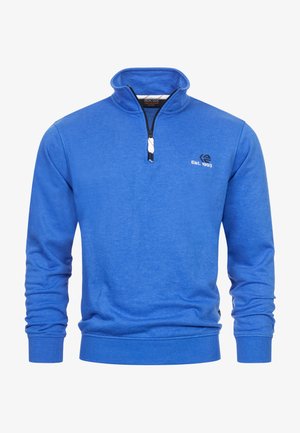 Blå fleece-pullover med høj krave og kvart lynlås. Har strikkede manchetter og kant, samt et lille logo på brystet. Blød tekstur.