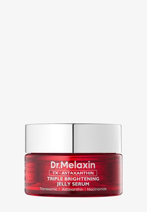 Tarro rojo con tapa plateada etiquetado como Dr. Melaxin TX Astaxanthin Triple Brightening Jelly Serum con Tranexámico, Astaxantina y Niacinamida.