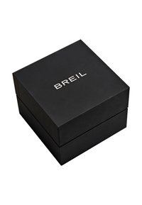Boîte carrée noire avec logo "BREIL" argenté centré sur le couvercle, fermé et isolé sur fond blanc.