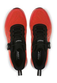 Red athletic shoes with a knitted upper, black accents, a secure dial closure mechanism, and a cushioned sole. Features pull tab and logo.