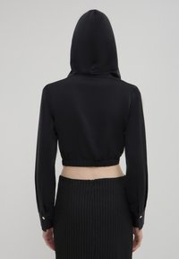 Calliope CON CAPPUCCIO  - Bluse - nero