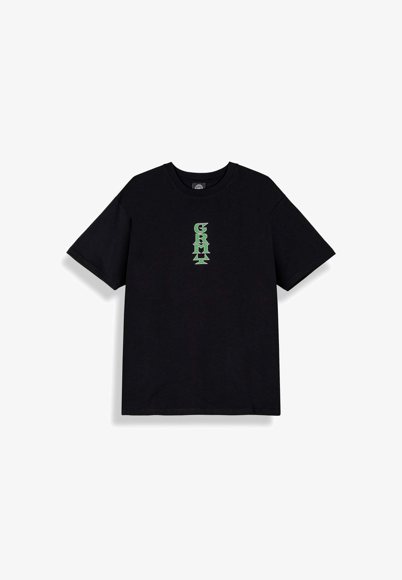 Maglietta nera a maniche corte con testo verticale verde "GRMT" al centro del petto, distesa su uno sfondo bianco.