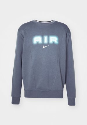 Felpa grigia con collo rotondo, caratterizzata da una grafica in rilievo "AIR" e un piccolo logo Nike bianco. Tessuto morbido e polsini e orlo a coste.