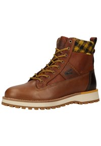 Brown leather lace-up boots with a yellow and black checkered cuff, rugged sole, and contrasting tan midsole. Features metal eyelets and stitching details.
