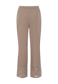 Pantalons ample couleur beige clair avec une taille élastique. L'ourlet inférieur présente des motifs découpés élaborés pour un détail supplémentaire.