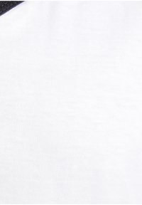 White cotton fabric with a smooth texture, featuring a dark gray, ribbed collar detailing.