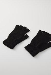 Black fingerless gloves made of textured knit material, featuring ribbed cuffs and open fingertips for increased dexterity.