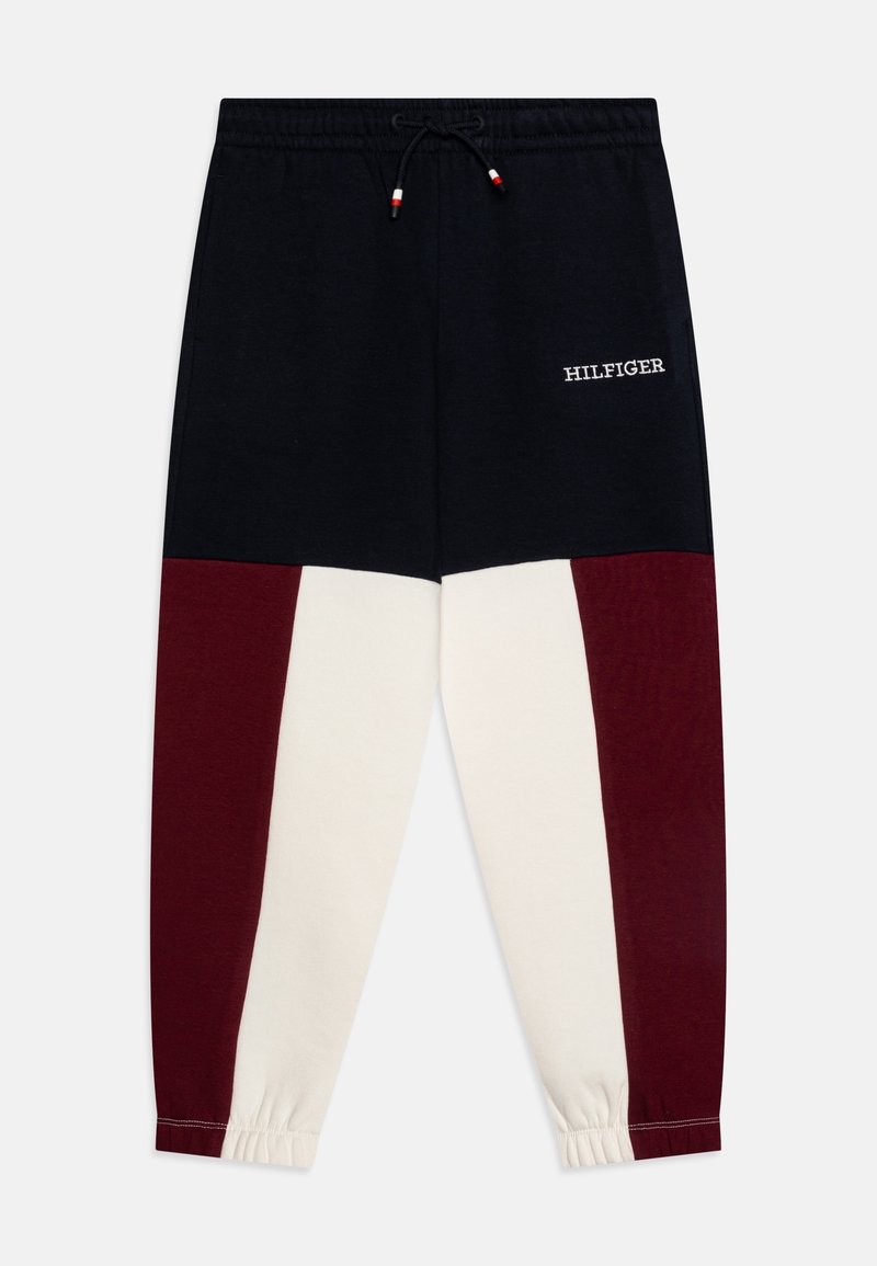 Bomulls-joggers med färgblockdesign i marinblått, vinrött och krämvitt, med elastisk midja och dragsko, samt "HILFIGER"-logotyp.