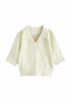 Elfenbenstrikket sweater med ribbede kraver og korte ærmer. Har et struktureret mønster og åbne strikdetaljer gennem hele toppen.