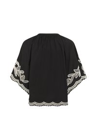 Blouse noire ample avec manches larges, broderie florale blanche sur les manches et ourlet festonné, encolure froncée, vue de dos.