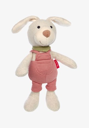 Plush rabbit toy with a beige face and pink snout. It wears pink overalls and a green collar, featuring floppy ears and black button eyes.
