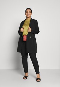 ONLY Carmakoma CARRIDE PANTS - Nohavice - black