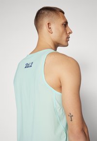 HOKA AIROLITE RUN TANK - Topper - light blue/orange