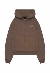 Brown zip-up hoodie with a hood, front pockets, and "RETERNITY" logo in white. Made from cotton fabric, featuring a soft texture.