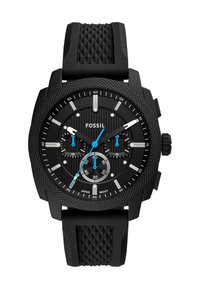 Reloj con correa de goma negra, caja texturizada, esfera negra audaz, tres subesferas, detalles azules en las manecillas y marcadores de hora luminiscentes.