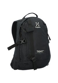 Zaino nero realizzato in tessuto testurizzato, con spallacci regolabili, fibbie frontali e logo. Design compatto etichettato "TIGHT X SMALL".