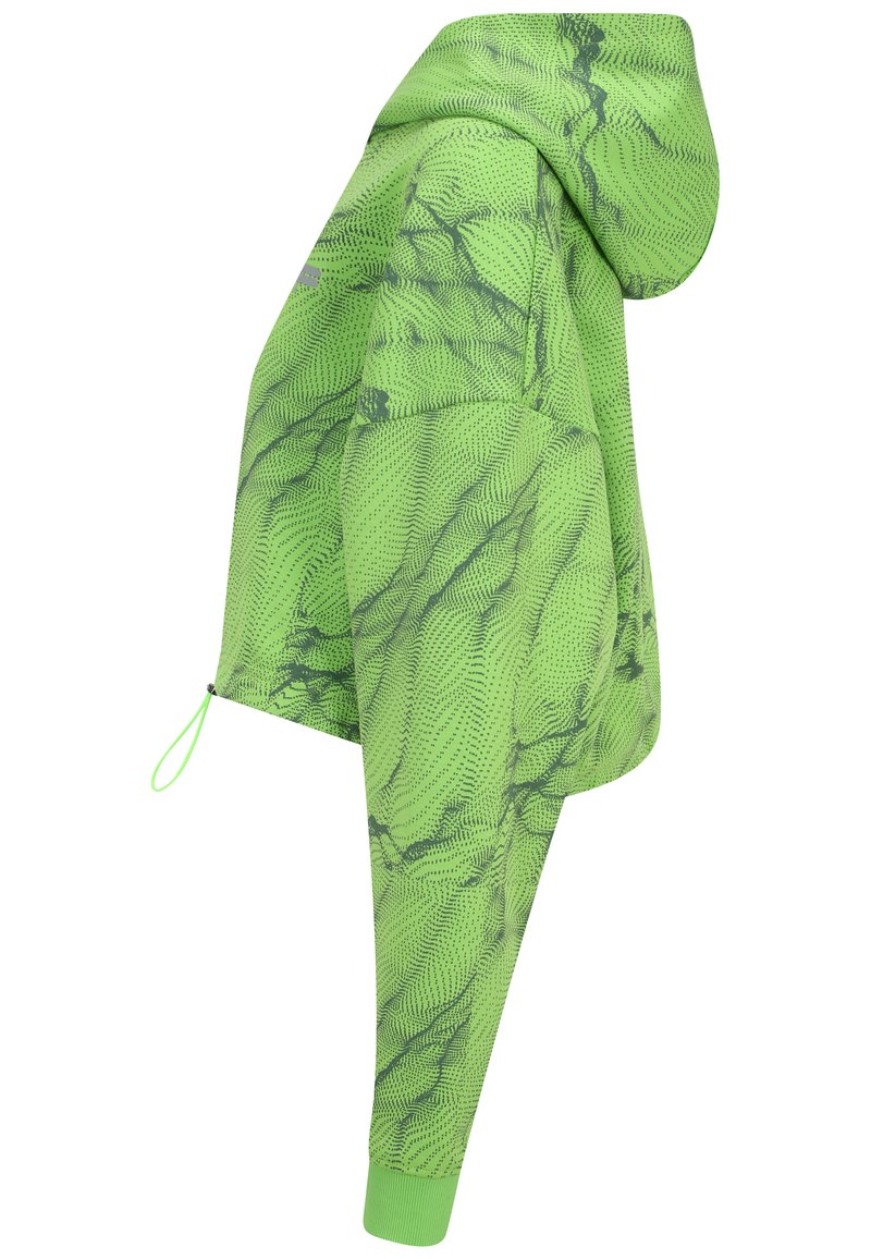 Chaqueta verde con capucha, presenta un patrón abstracto de puntos oscuros, mangas largas, puños elásticos y cordón ajustable en el dobladillo.