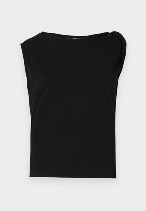 Black short-sleeve top made of smooth fabric. Features a round neckline and draped detail on the shoulder. Simple, fitted design.