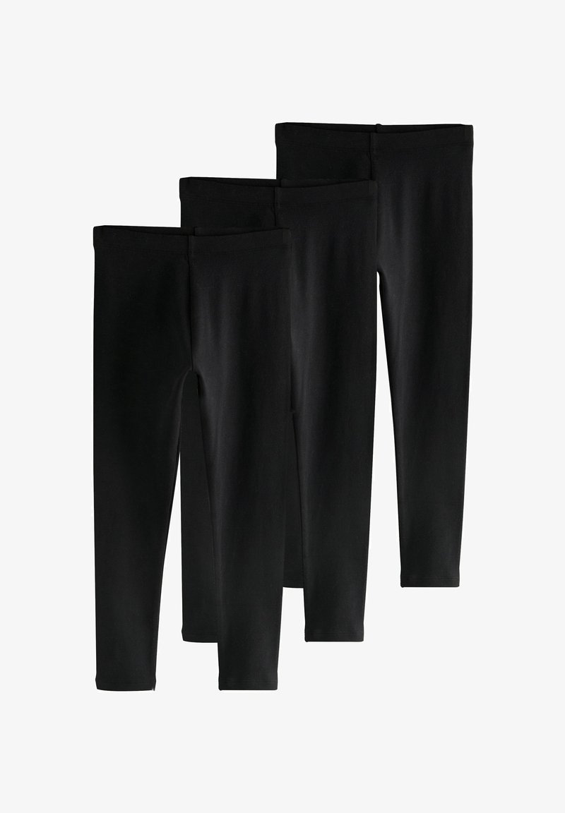 Trois paires de leggings noirs unis, longueur intégrale, empilées côte à côte sur un fond blanc.