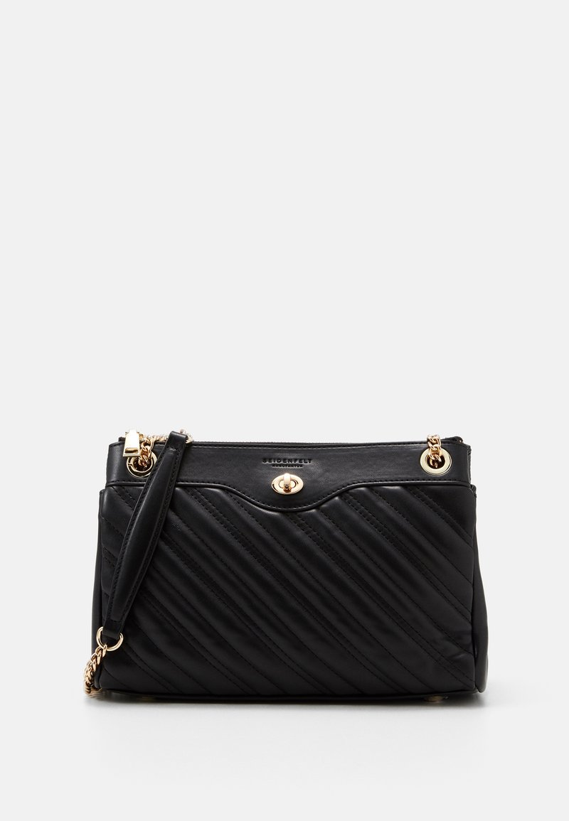 Mustaköinishandbag, jossa on vinoneliöhaku, kultasävyiset yksityiskohdat, ylhäältä avattava vetoketju ja irrotettava olkahihna.