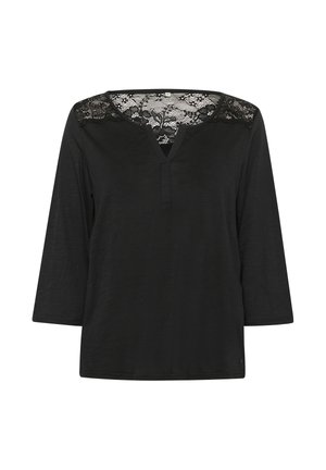 Chemise noire à col en V avec des manches en dentelle 3/4, présentant un tissu texturé et un accent en dentelle sur les épaules. Détail de boutons à l'avant.