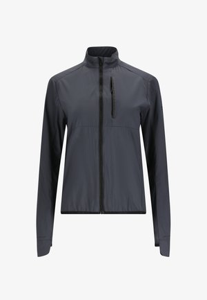 Veste coupe-vent légère, gris foncé, avec un col montant, une fermeture éclair frontale et une poche poitrine. Elle se distingue par une texture lisse et une coupe ajustée.