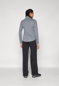 Nike Performance BLISS TROUSER - Kelnės - black